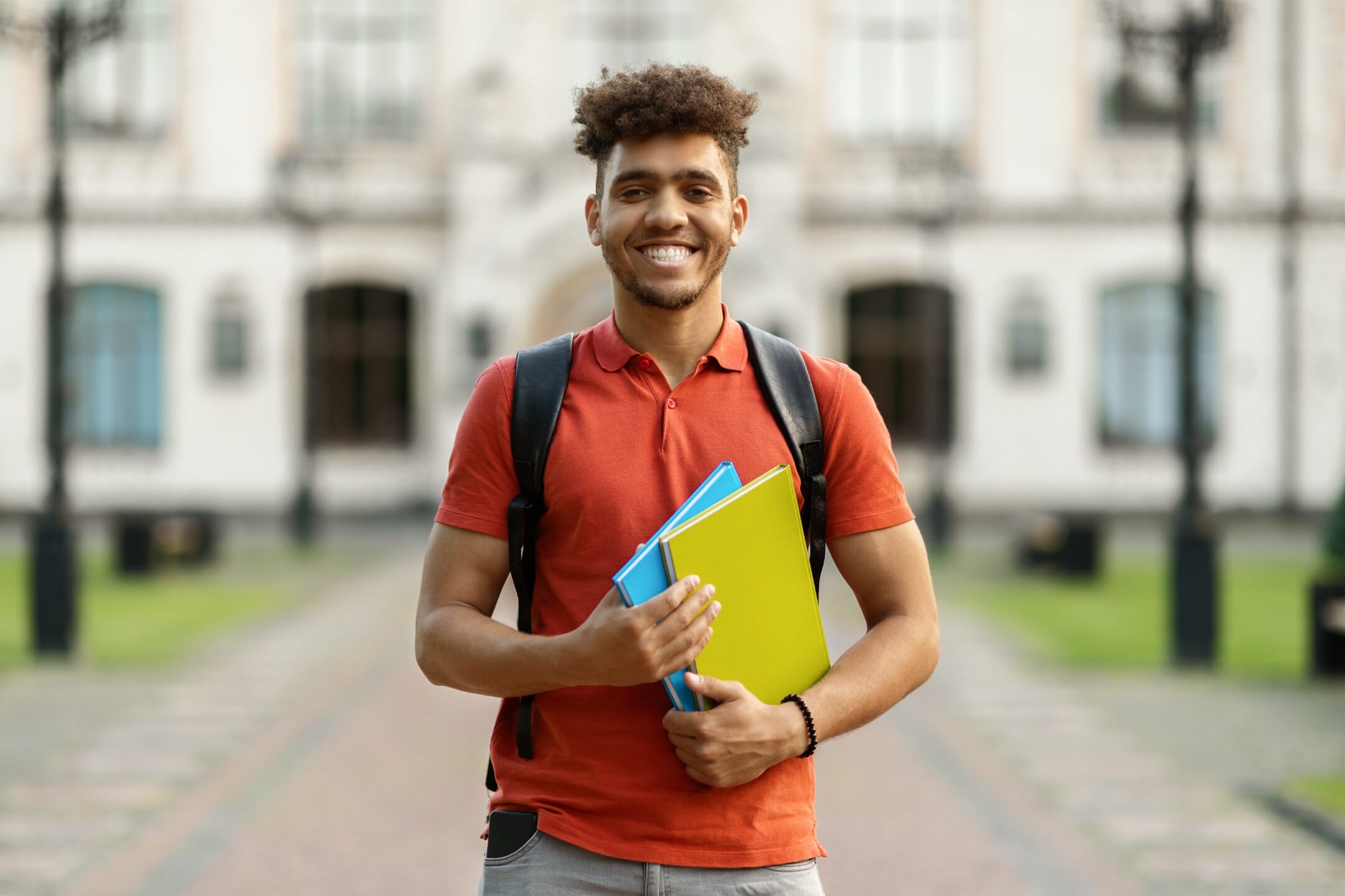 male student outside a college